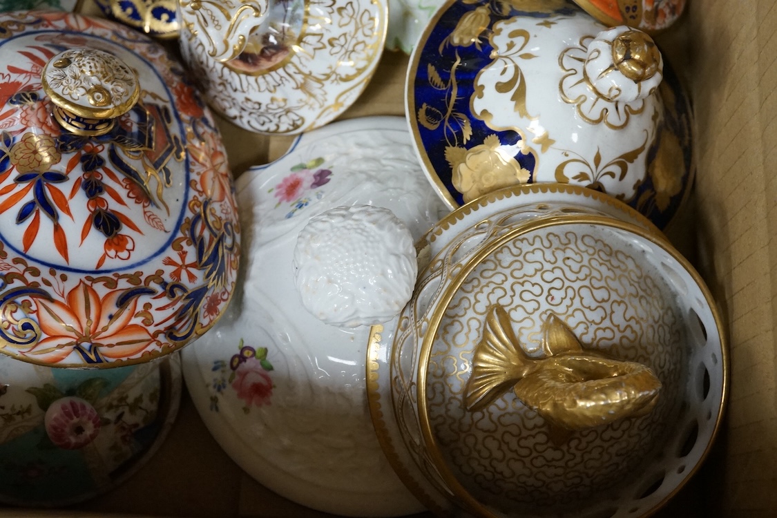 A collection of porcelain tureen and pot covers, largely 19th century